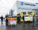 Zimmer Biomet cheque handover to Bumbleance web